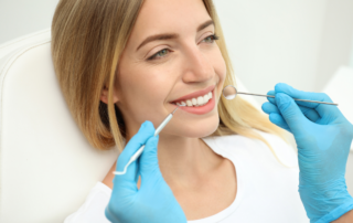 woman receiving cosmetic dentistry services