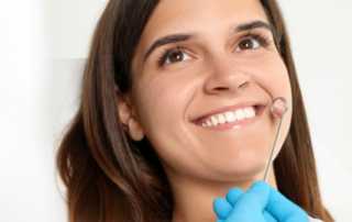 woman receiving cosmetic dentist treatment